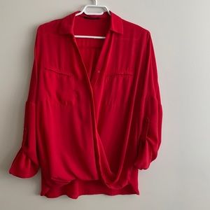 Red blouse with collar.